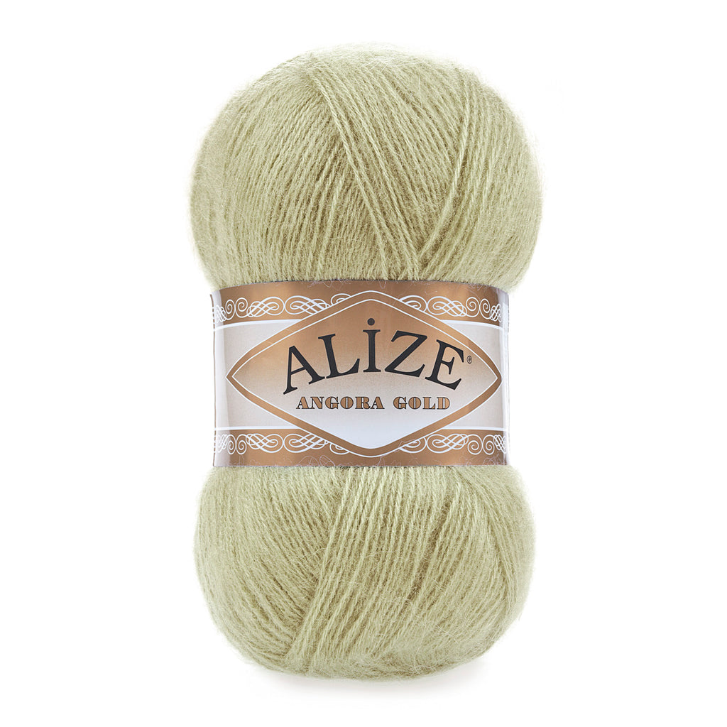 Zu sehen ist Alize Angora Gold Wolle in einem zarten Pastellgrün; weiches, leicht flauschiges Strickgarn, ideal für Pullover, Schals und kreative Handarbeitsprojekte.