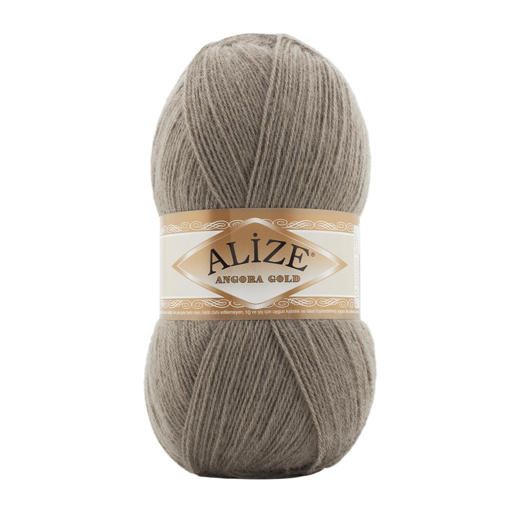 Zu sehen ist Alize Angora Gold Wolle in einem beigen Grauton; weiches, leicht flauschiges Strickgarn, ideal für Pullover, Schals und kreative Handarbeitsprojekte.