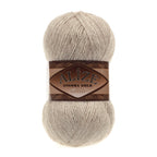 Zu sehen ist Alize Angora Gold Simli Wolle in einem warmen, beigefarbenen Melange‑Ton mit feinem, schimmerndem Glanz durch eingearbeitete metallische Fäden. Das weiche, flauschige Strickgarn eignet sich ideal für Pullover, Schals und vielseitige Handarbeitsprojekte.