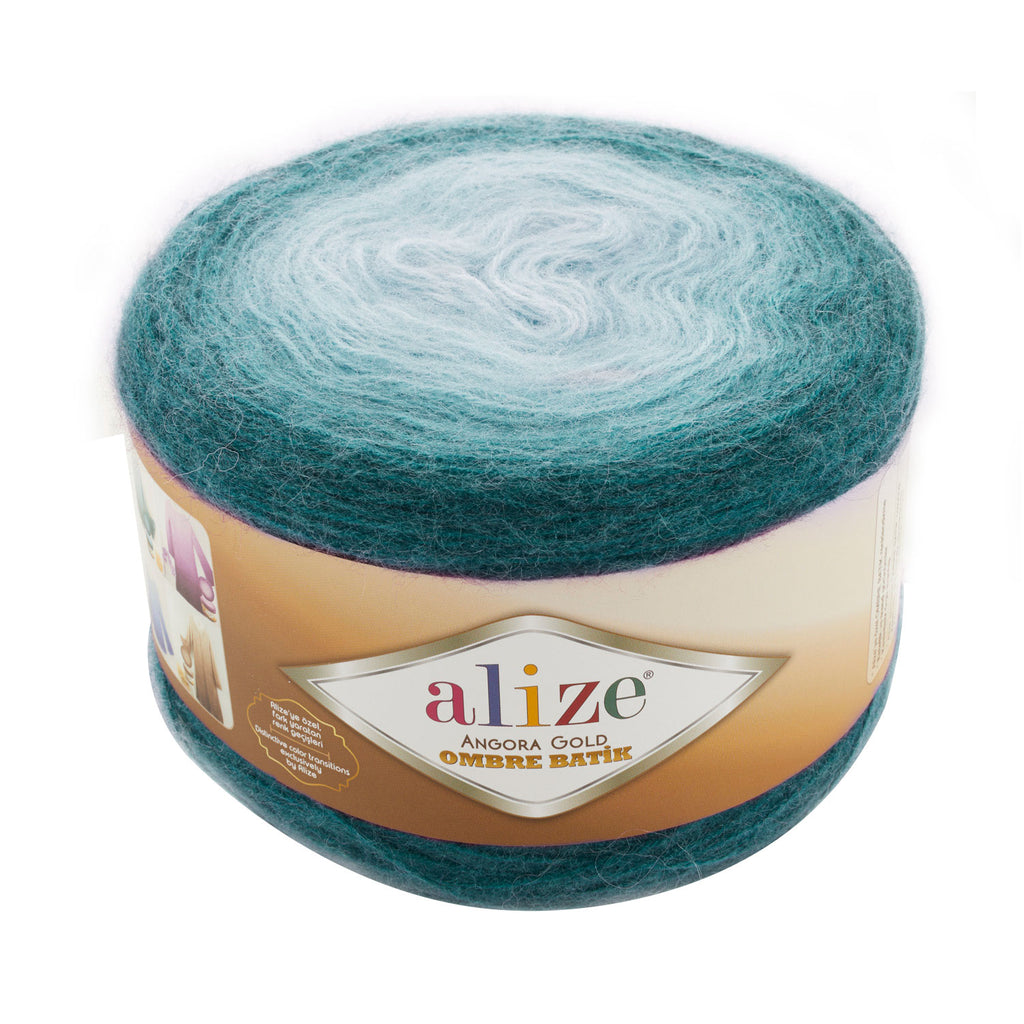 Zu sehen ist Alize Angora Gold Ombre Batik Wolle mit Farbverlauf von Türkis bis Hellblau, weiches Strickgarn für Pullover und Schals.