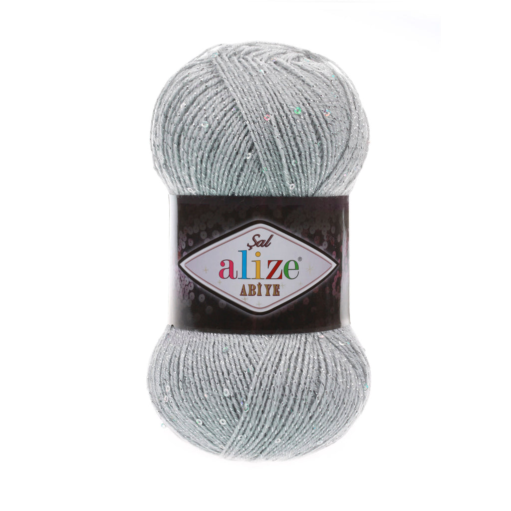 Zu sehen ist Alize Sal Abiye Wolle in einem mittleren Grau mit funkelndem Schimmer und Pailletten; ein leicht glitzerndes Garn mit Metallic‑Effekt, ideal für elegante Schals, Accessoires und besondere Handarbeitsprojekte.